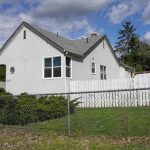 Charming and affordable home on three lots for sale in Vernon, BC perfect for a first time buyer or a growing family. Call John Deak of Century 21.