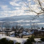 Coldstream home for sale has 2 full living spaces, both with huge views of Kal Lake, plus hot tub & more. Call John Deak of Century 21 in Vernon BC.