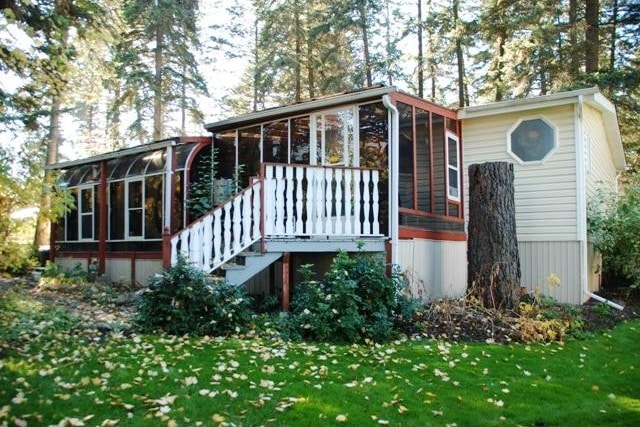 Gorgeous manufactured home for sale in Pallisades Park, Armstrong, BC. Full of features, and nestled in the trees, you love it.
