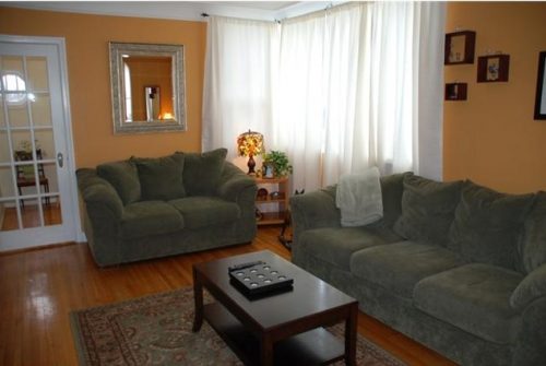 Cozy and pretty living room in the charming starter home in Vernon, BC. Call John Deak Royal LaPage for details