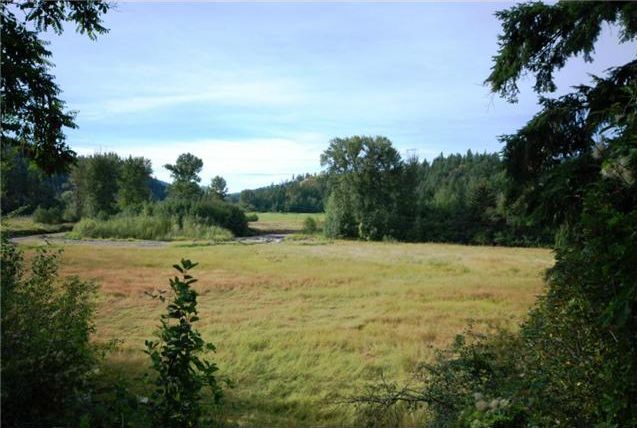 John Deak of Royal LaPage has this 43.35 acre property for sale near Vernon, BC, with beautiful views, hay fields, a home with shop and several outbuildings.