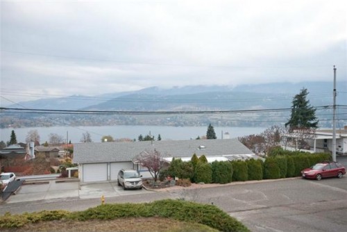 Huge views of Kalamalka Lake from this updated family friendly, 4 bedroom 2 bath home for sale by John Deak in Coldstream BC