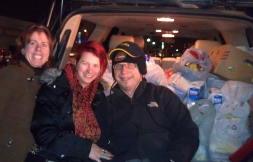 John and Teresa Deak and Christina Van Soest with the generous food donations collected in Vernon BC during the 34th Annual Realtors Food Drive December 7, 2011.
