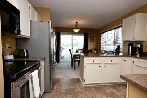 You'll love the bright and efficient kitchen in this BX are home for sale in Vernon BC listed by John Deak of Royal LaPage.