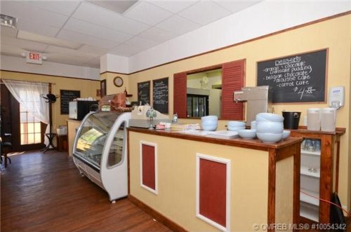 When used as a restaurant there is ample space for the front counter as well as a large kitchen at this commercial location on Kal Lak Road listed for sale by John Deak of Royal LaPage.