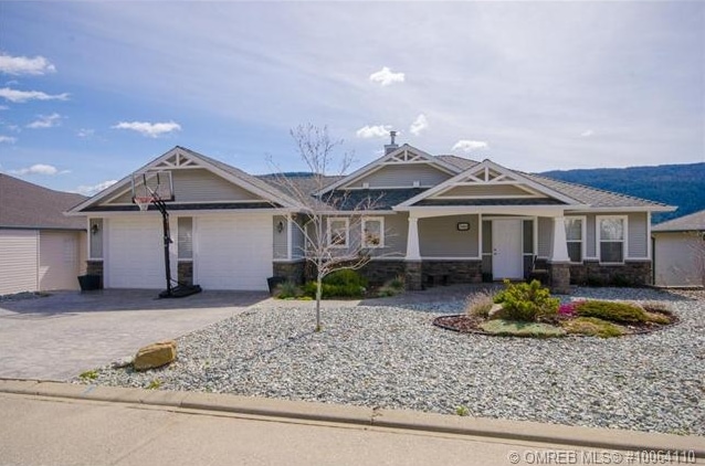 Executive 4 bed 3 bath home with commanding views of the valley listed for sale in Foothils area of Vernon BC by John Deak of Royal LaPage.