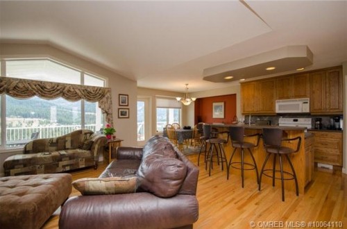 Executive 4 bed 3 bath home featuring open concept kitchen, living and dining area, listed for sale in Foothils area of Vernon BC by John Deak of Royal LaPage.