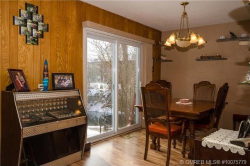 Watch the birds and the stream from the dining room table at 2176 Quesnel Road Lumby BC listed for sale by John Deak Royal LaPage.