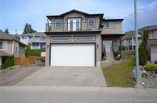 Front of 5717 Richfield Place in Bella Vista Vernon BC listed for sale by John Deak of Royal LaPage.