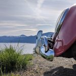 The Little Red Beetle pauses its adventures long enough to take in the view of Okanagan Lake at Adventure Bay in Vernon BC