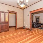 Parlour with pocket doors to living room at 3070 Becker Street, Armstrong BC