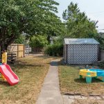 Back yard with lane access at 1909 44 Street, Vernon BC