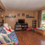 Living room with access to patio at 1909 44 Street, Vernon BC