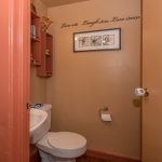 Powder room by front entrance at 1909 44 Street, Vernon BC